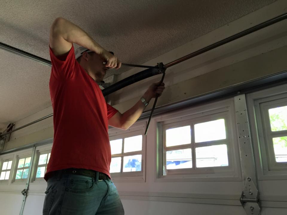 adjusting the garage door opener springs