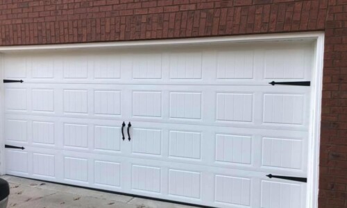Stamped Steel Carriage Door - Timeless Collection Stamped Steel Carriage Door - Timeless Collection